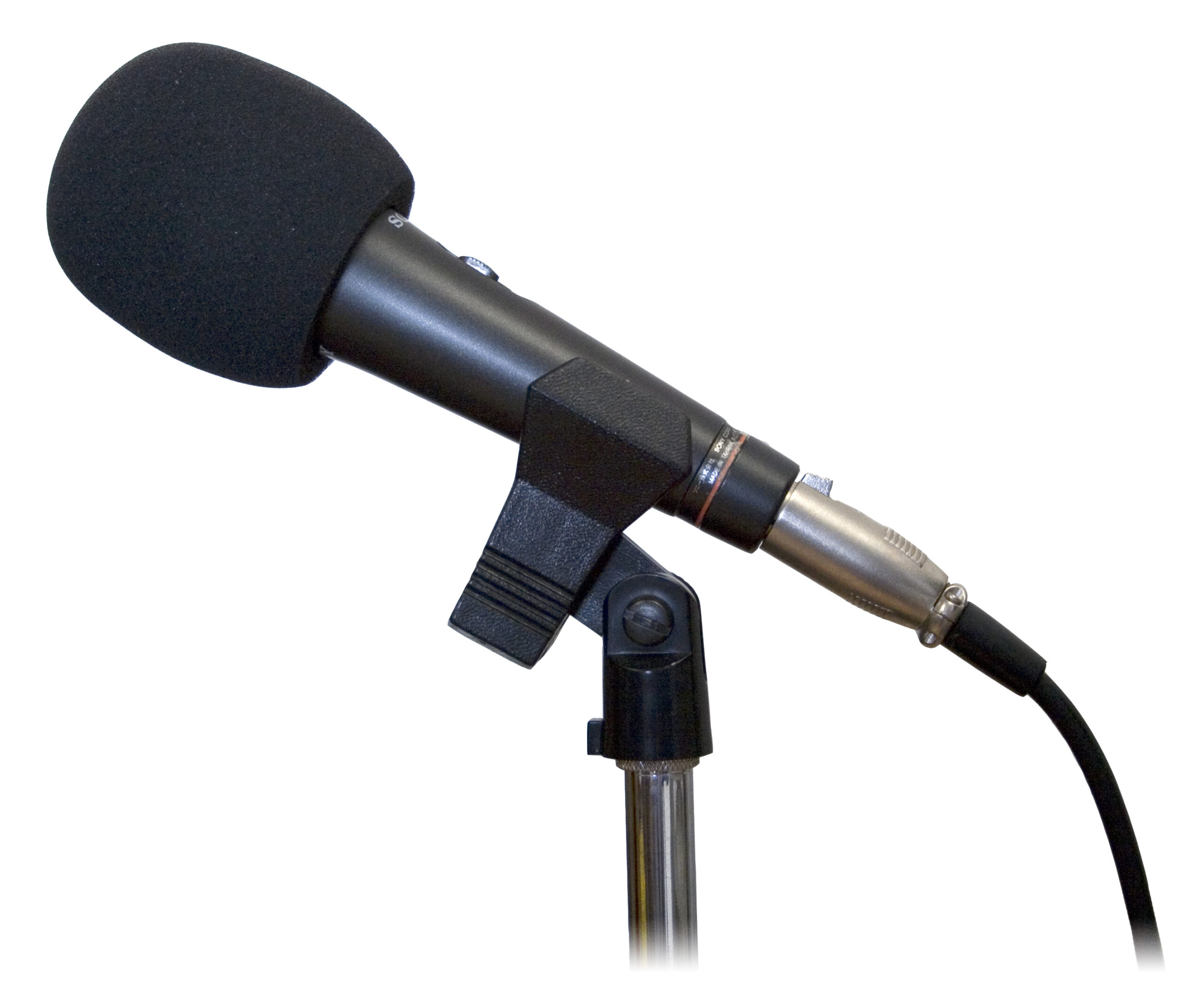 Studio microphone with foam windscreen on a stand