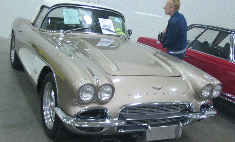 A 1961 Chevrolet Corvette at a classic car auction — illustrative image, not a photograph of Derek Mathewson