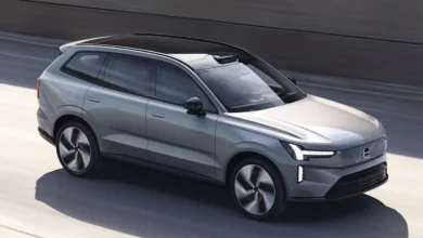 Volvo EX90 flagship electric SUV driving on the road