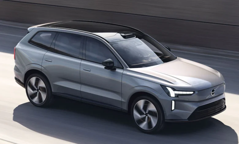 Volvo EX90 flagship electric SUV driving on the road